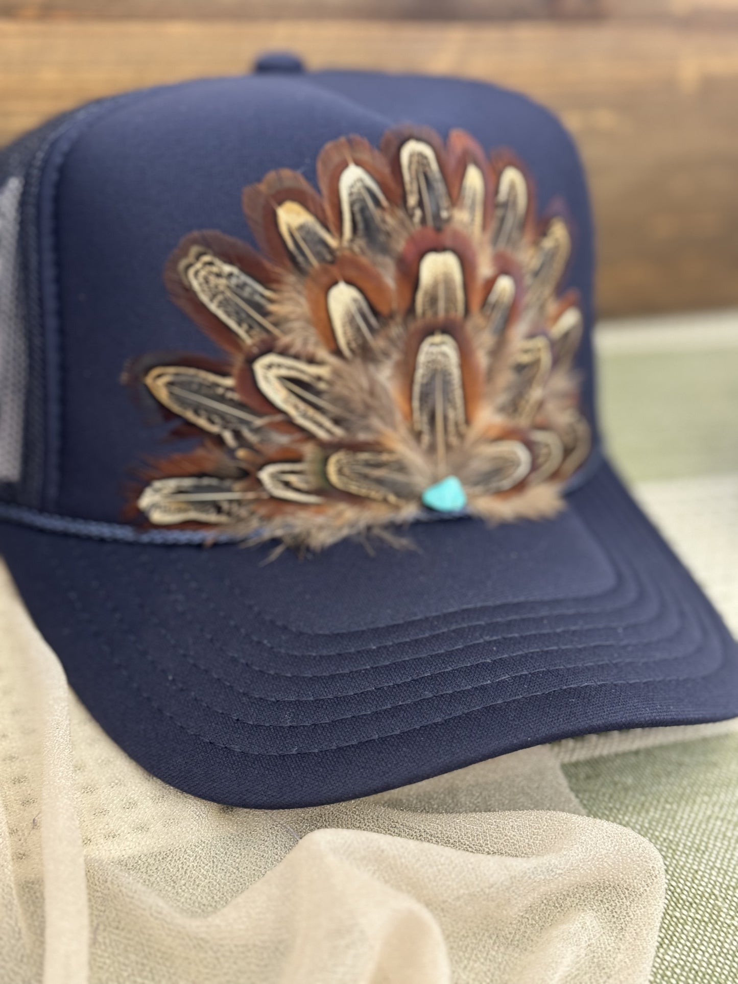 Wild Horse Feather Trucker